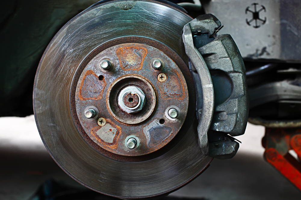 What are the causes behind the brake rotor wrap?
